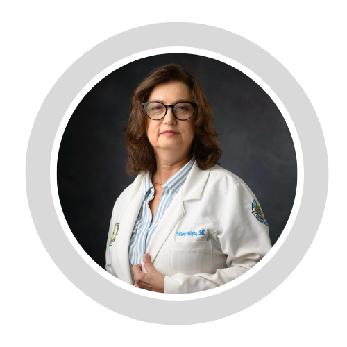 Portrait of Dr. Valerie Wojna in a white coat